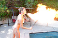 Watch amazing bikini babe shay breathe fire by the pool in this hot trick then get her hot pussy rammed hard in these dildo fucking 3some lesbian pics