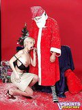 Short haired blondie in skirt gets undressed by Santa and mouth drilled