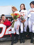 Amazing hot pornstarks fuck a race car driver in pit lane before the race