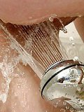 Slim blonde European teen cutie fingering her slit in the bath