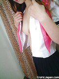Sexy Japanese schoolgirl Kotono shows her perky tits